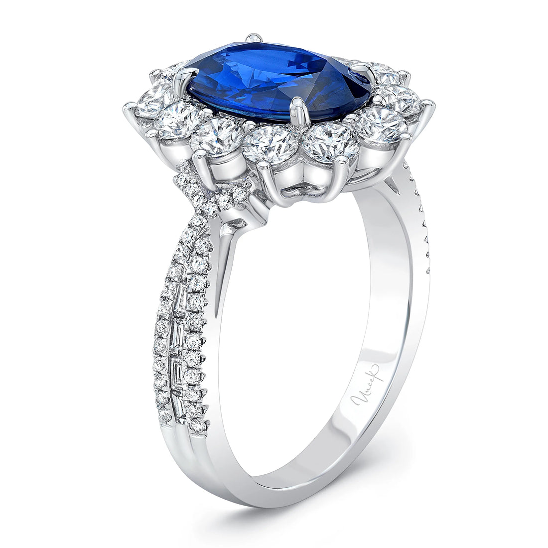 Uneek Oval Blue Sapphire Cocktail Ring with Sunburst Diamond Halo and Tapered Diamond Accents
